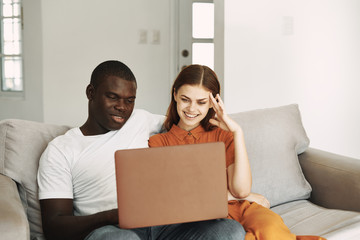 couple looking at a digital tablet