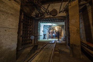 Fototapeta na wymiar Underground magnesite ore mine tunnel with waterproof gates