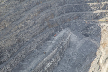 Magnezite ore quarry open pit mine at summer day