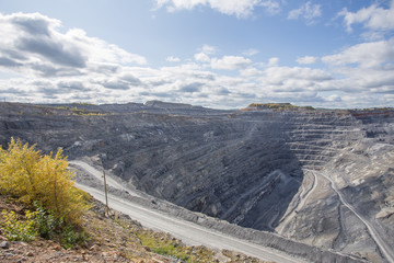 Magnezite ore quarry open pit mine at summer day