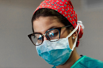 Nurse with mask in hospital