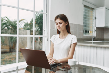 businesswoman working on laptop in office