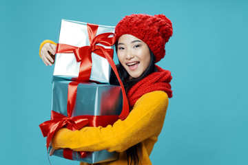 young woman with christmas presents