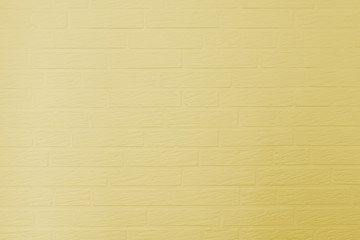 Yellow painted brick wall texture
