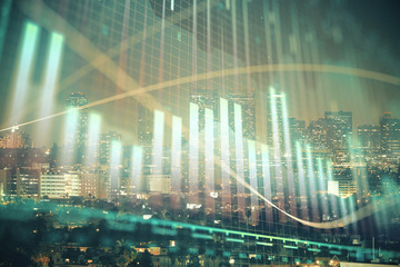 Financial graph on night city scape with tall buildings background multi exposure. Analysis concept.
