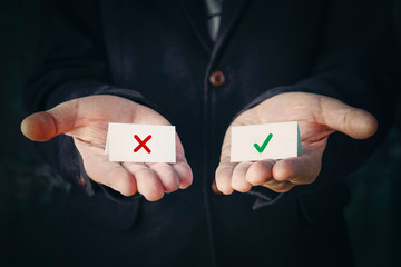 The concept of choosing the right or wrong option. business man select choice