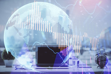 Forex Chart hologram on table with computer background. Double exposure. Concept of financial markets.