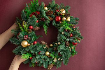 Fototapeta na wymiar Wreath decoration with New Year's toys. Christmas decoration. Christmas decor. Merry Cristmas