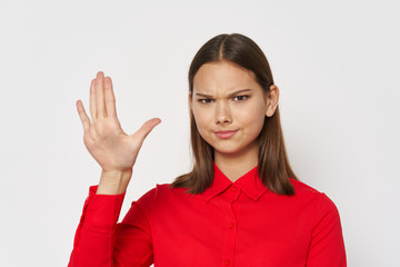 young woman showing ok sign
