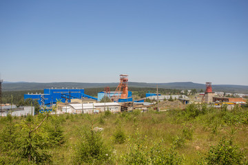 Mining site with mine headframe landscape view