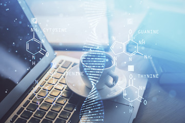 Desktop computer background and DNA drawing. Double exposure. Science concept.