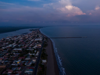 Obraz premium Beautiful aerial view of the city of Puntarenas and the Paseo de los turistas at the sunset in Costa Rica