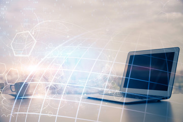 Naklejka premium Multi exposure of table with computer and world map hologram. International data network concept.