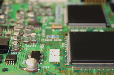 Closeup of electronic circuit board or PCB printed circuit board