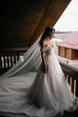 morning of the bride. bride on the balcony in the morning