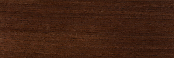 Excellent dark brown venge veneer background as part of your strict style. Natural wood texture, pattern.