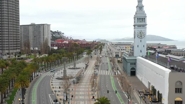 Aerial clip flying over the san francisco embarcadero during the April 2020 covid-19 coronavirus quarantine 