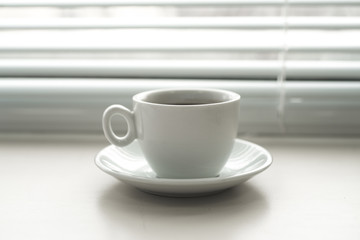 Black Coffee Cup on Table in Office
