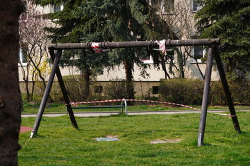 Children's playground is closed. Ban on children 's playgrounds. Prevention of coronavirus COVID-19. The fight against the virus. No children on the Playground in the yard.