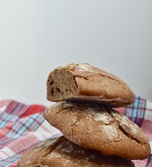  Bread. Several loaves of rye homemade bread. Place for text.