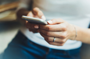 workplace at home, person using smartphone isolated, hipster manager holding mobile gadget, girl texting message sms, connect concept, female hands touch digital screen,