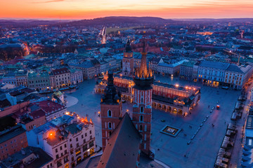 Krakow main square and st Mary basilica at dusk aerial drone view - obrazy, fototapety, plakaty
