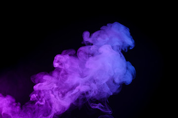Colorufl puff of smoke isolated on black background - obrazy, fototapety, plakaty