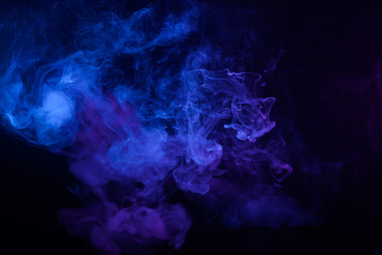 Clouds of blue smoke abstract background