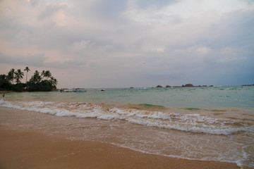 indian ocean with sri lanka coastal sand