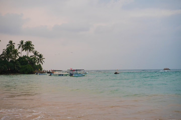 indian ocean with sri lanka coastal sand