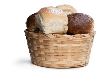 Group mini buns in wicker basket isolated on a white