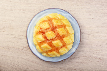  Pineapple bun on wooden table