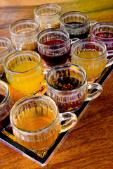 Closeup of Bali coffee, luwak coffee, fruit and herb tea testing set. Bali, Indonesia.