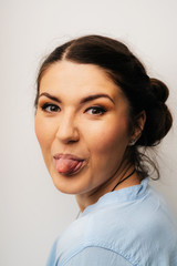 Girl showing tongue