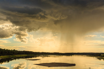 Rain Falling at Sunset