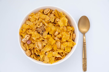 cereal in a white bowl on white background. Healthy breakfast concept.
