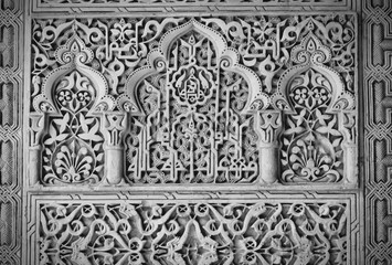 Fototapeta na wymiar Alhambra ornaments in Granada. Black and white vintage style.
