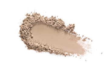 Face makeup powder texture. Beige eye shadow swatch smudge isolated on white. Light brown nude make...