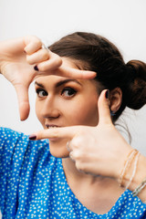 Fototapeta premium girl making hand frame
