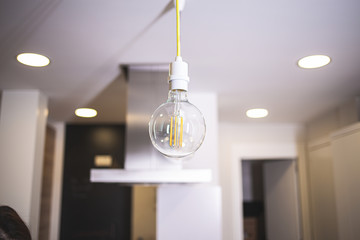Lamp bulb light isolated on an indoor room scene