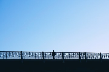 tourists walking across the bridge in Bilbao city, Spain