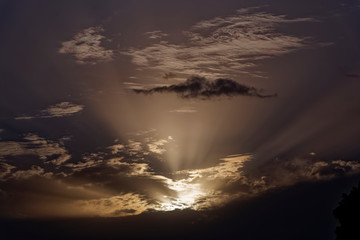 Sunset over the clouds