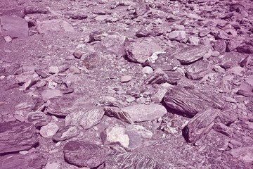 Dry river bed texture. Retro filtered color style.