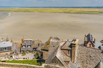 Mont Saint Michelle in France between Brittany and Normandy, a former medieval rock abbey with...
