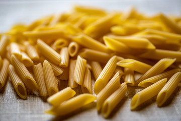 Uncooked Penne rigate pasta