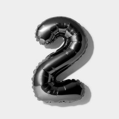 Number 2, Black foil balloon number two isolated on a white background with Clipping Path