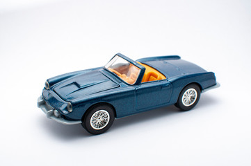 Obraz na płótnie Canvas Blue toy car on white background