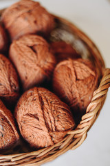 A close up shot of natural colored balls of yarn