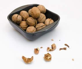 fresh walnuts, superfood, healthy foods, nuts on a wooden surface, close-up