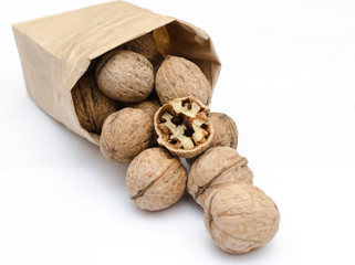 fresh walnuts, superfood, healthy foods, nuts on a wooden surface, close-up